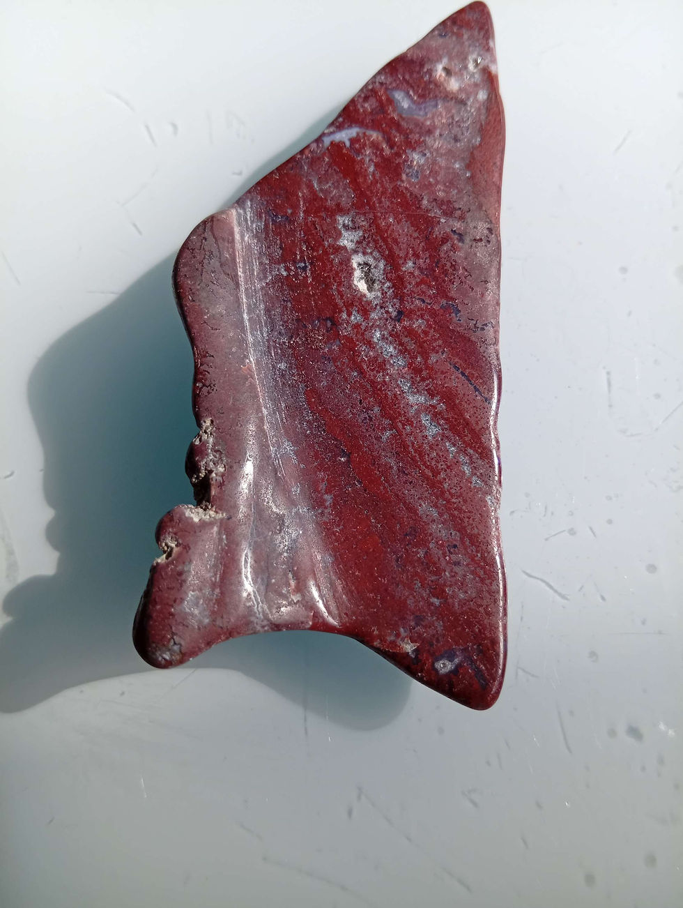 a slice of polished red jasper