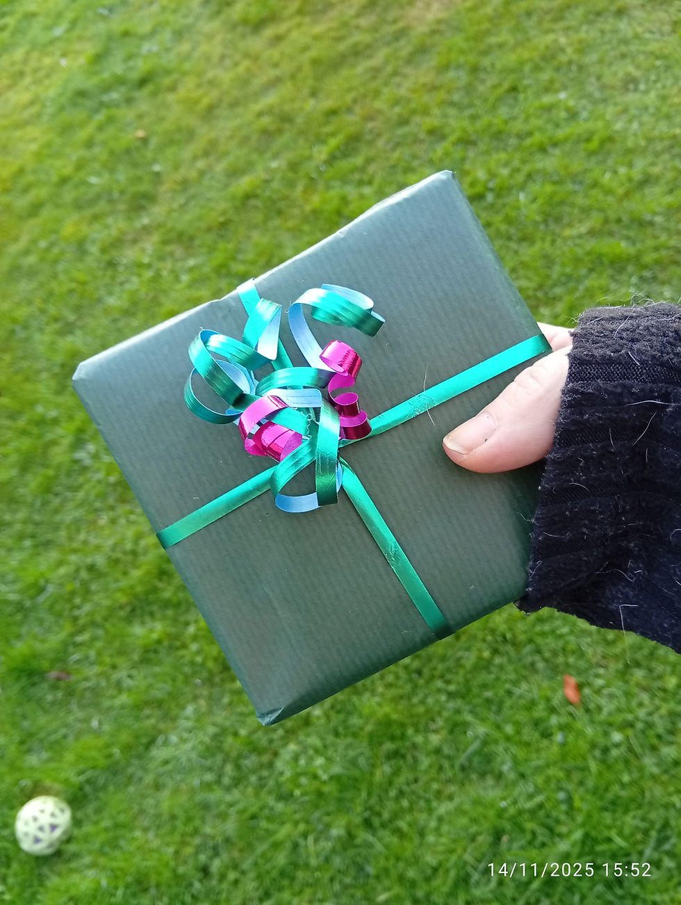 Miniature : The outside view of the wrapped up Stone Circle Christmas gift full of Scottish rocks.
