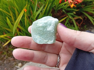 a piece of green aventurine in the  rough