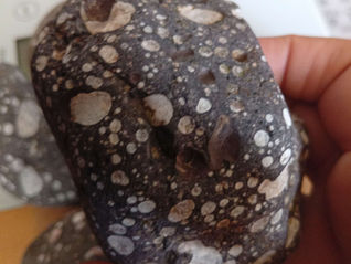 This galaxy stone - or amygdaloidal vesicular basalt - has mostly calcite in its vugs.