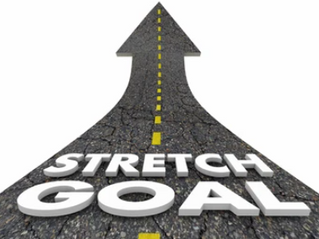 Road heading up with the legend Stretch Goal