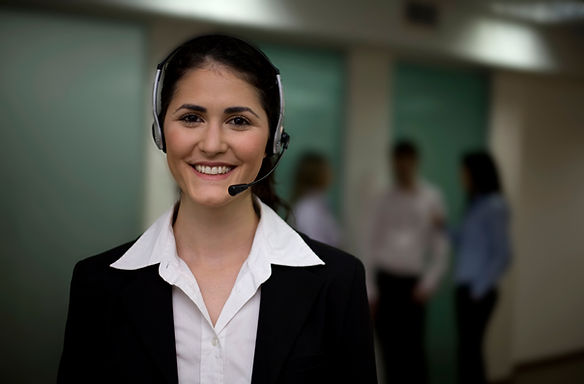 Smiling business woman with headset