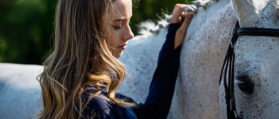 Horse-with-a-girl-next-to-the-horse.jpg