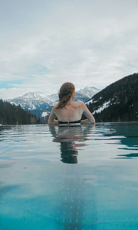 women in pool with mountains.jpg