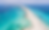 Aerial view of yachts anchored off Ses Illetes beach in Formentera with turquoise waters and white sand