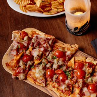 Pizza on table at the Club