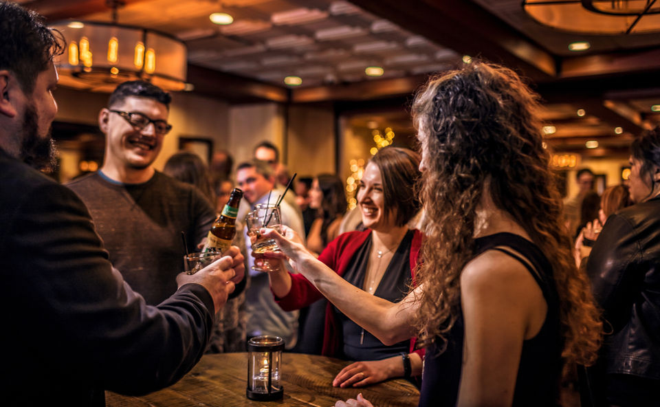 Group cheersing at party in the banquet rooms