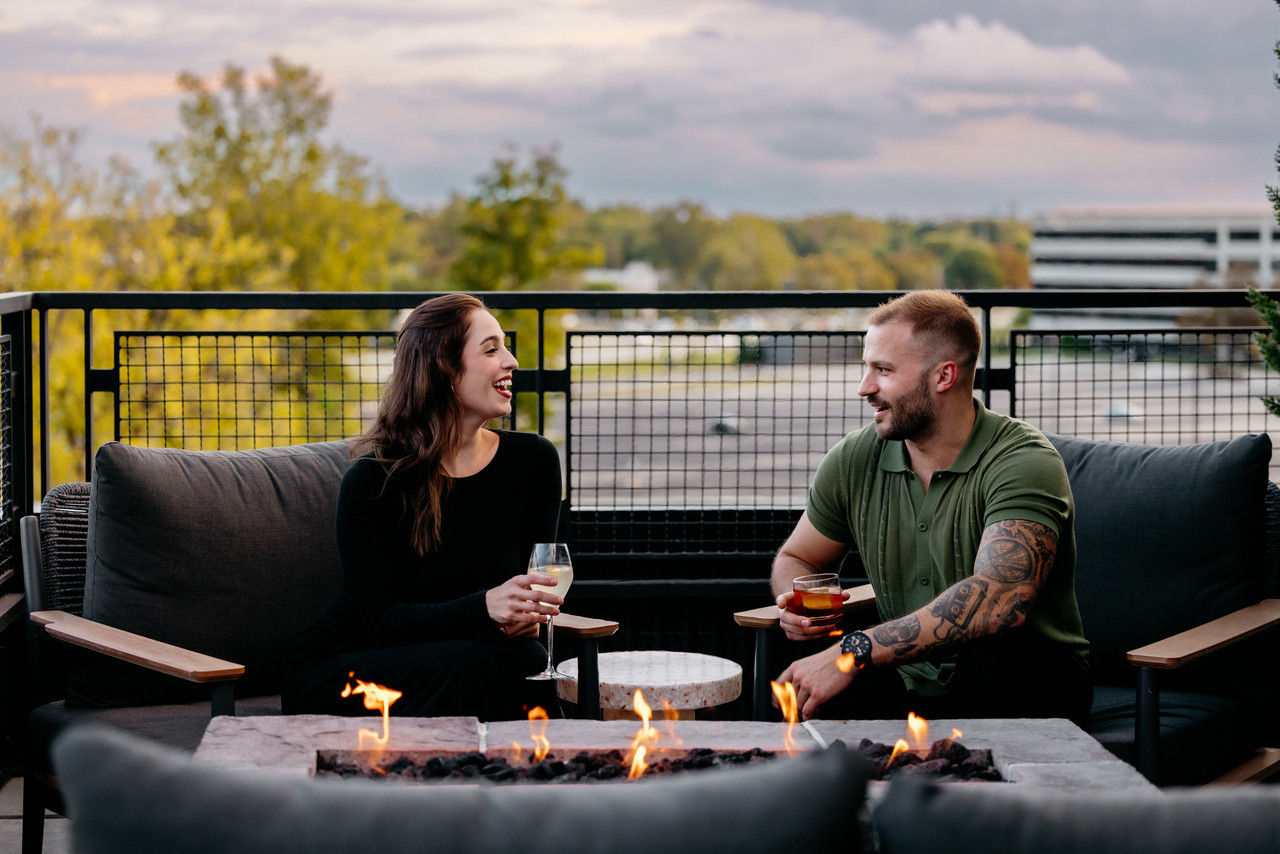 Sitting by a fire on the terrace