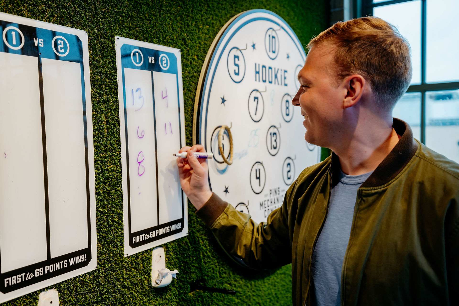 Play darts at Pins Mecahnical Co. located in Bottleworks District