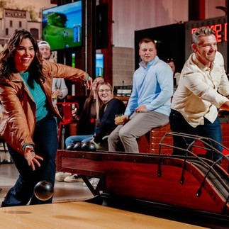 two people bowling at Henry Dorrbaker's 