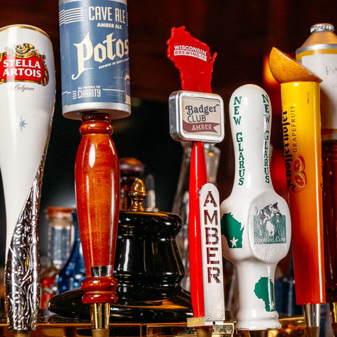beer taps featuring different Wisconsin beers