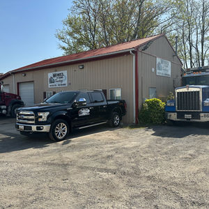 Office building and business truck - Monel & Sons Trucking Inc.