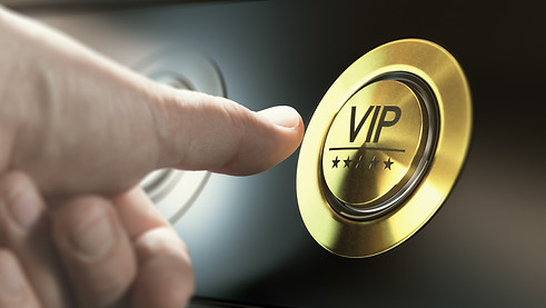Man with private access to VIP services pressing a button to ask a concierge. Composite im