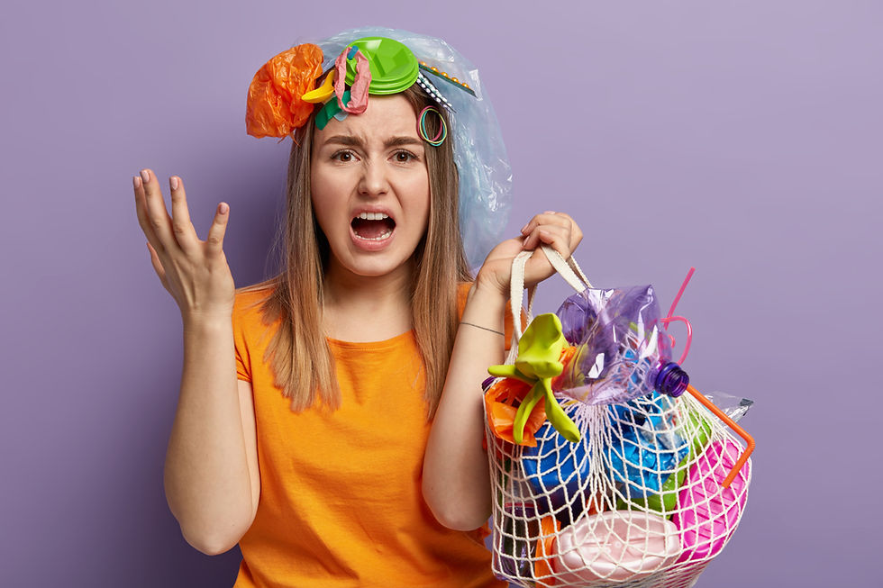 white gen Z woman overwhelmed by the cheap made in china plastic junk from her latest Amazon haul. 
