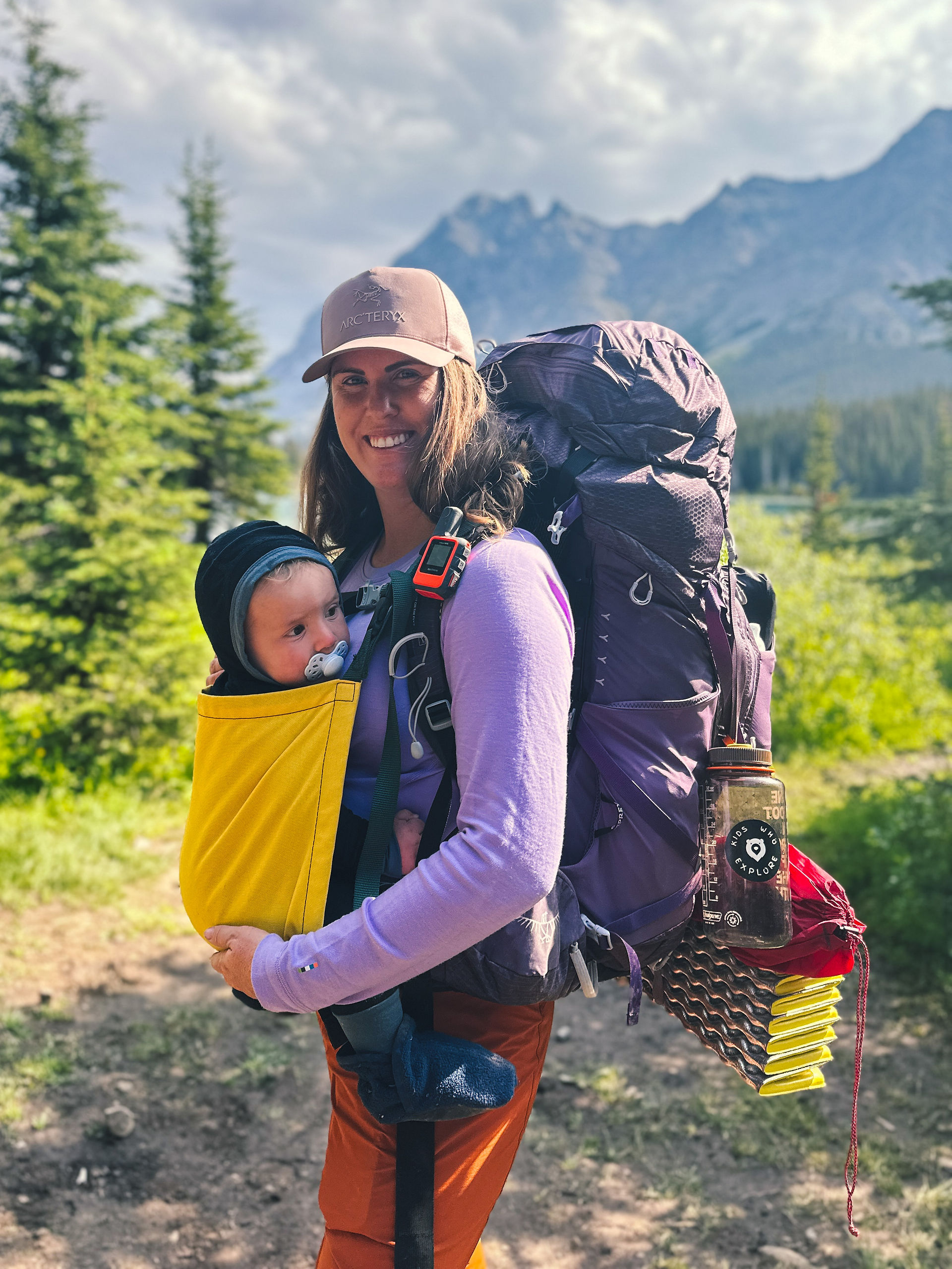 backpacking mom with baby in trail magik