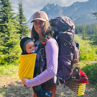 backpacking mom with baby in trail magik