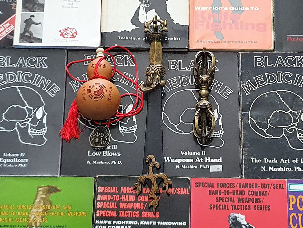 philosophical items on top of martial arts books