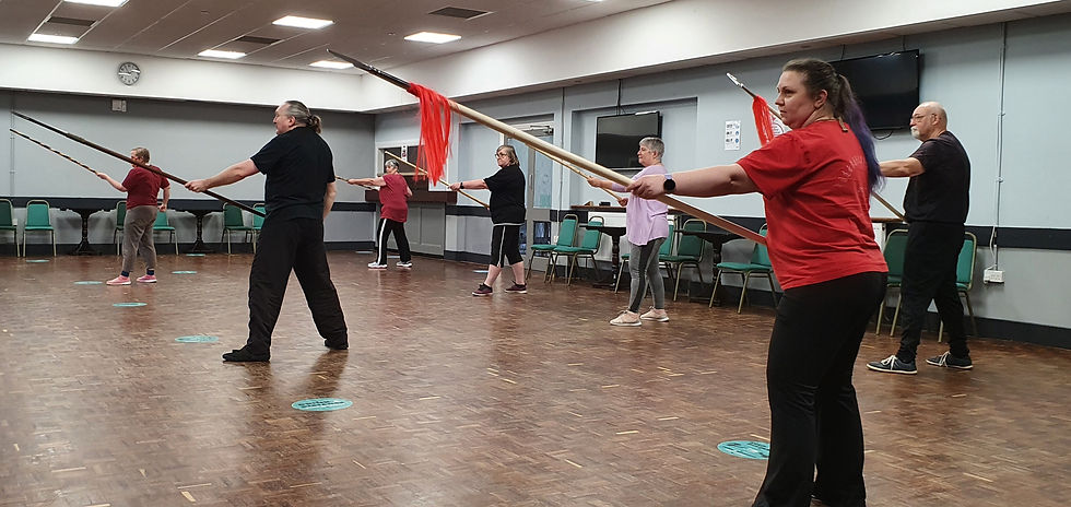 Students practicing with spears