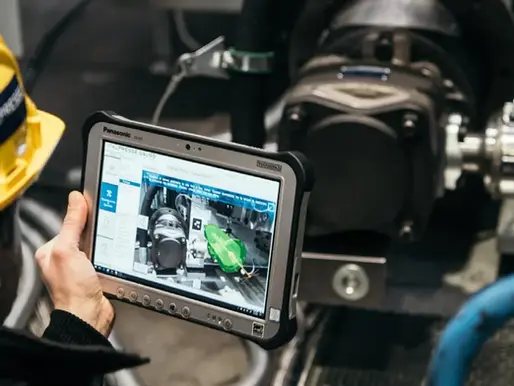 Worker uses AVEVA technology on a tablet