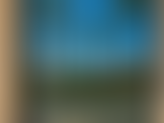 technician cleaning office windows in Ontario business plaza