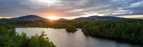 A wideshot of Saranac Lake during sunset