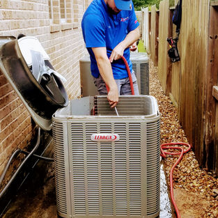 Performing Air Conditioning & Heating Maintenance