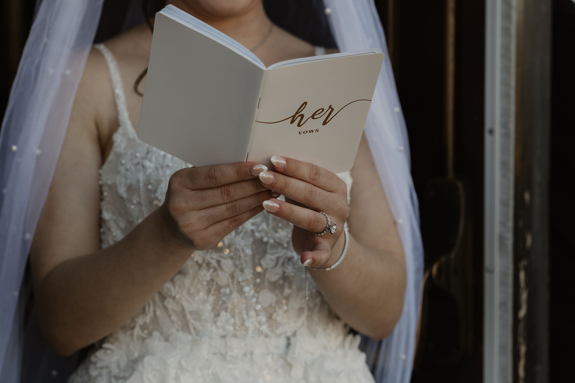 details and close up of brides vow book
