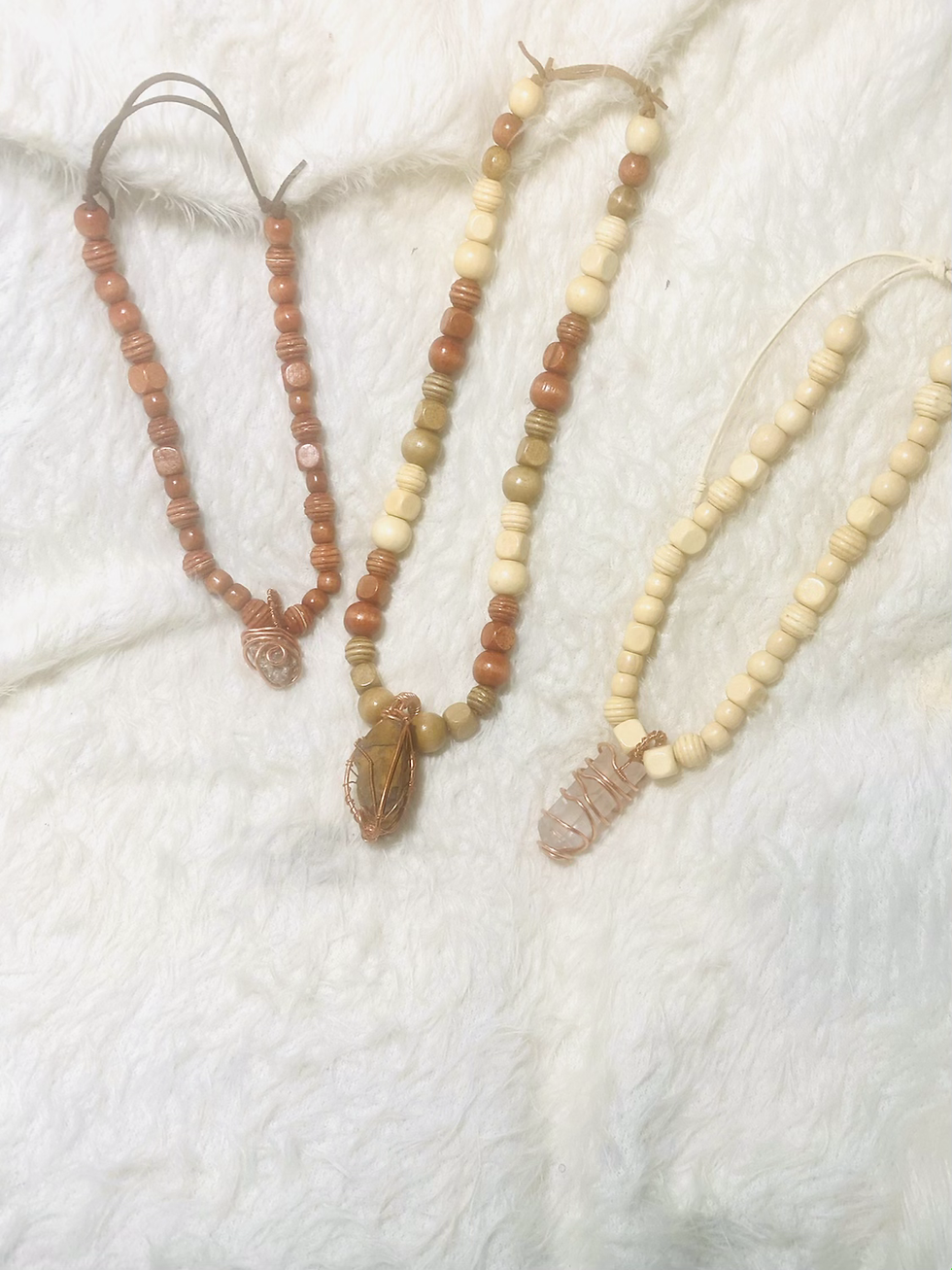 Thumbnail: Clear Quartz Point white light tan wooden beads (Large)