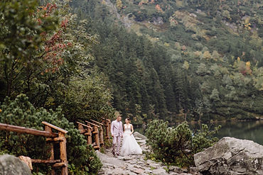 romantic-wedding-couple-love-standing-sea-eye-lake-poland-tatra-mountains.jpg