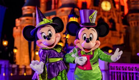 Mickey and Minnie dressed in Halloween costumes at the Halloween Party.
