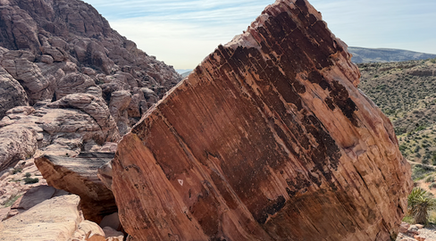 Large boulder protruding from one of the trails