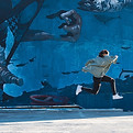 Jumping Against Mural
