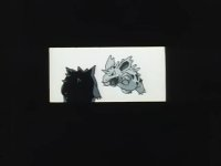 Silhouetted figure watches a screen featuring two cartoon creatures, Nidorino and Gengar. Dark surroundings.