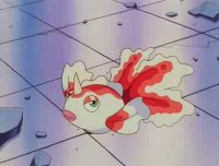 Misty's Goldeen lying helplessly on its side on a tiled floor.
