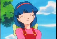 Anime girl with blue hair and pink overalls smiles in a sunny outdoor scene with trees and blue sky.
