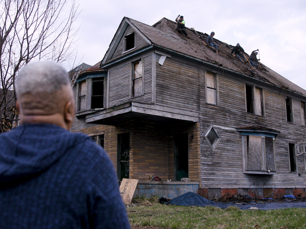 We Want Green Too crew on a Detroit home