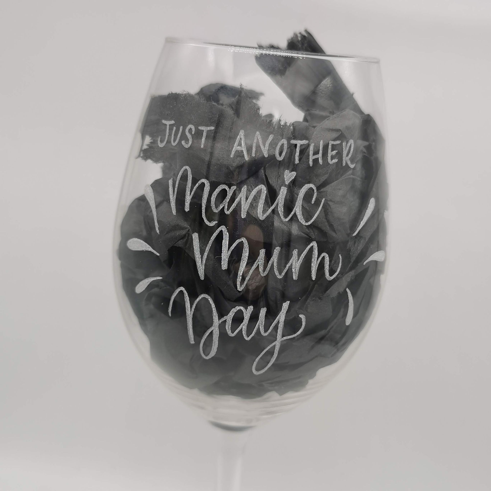 hand engraved wine glass with the words "just another manic mum day"