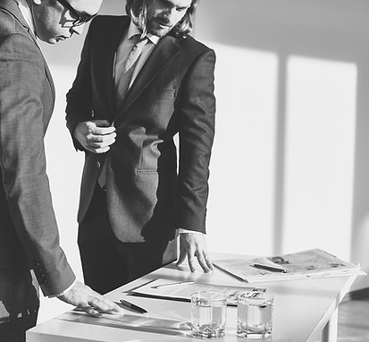 Ad men reviewing contract