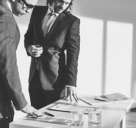 Ad men reviewing contract