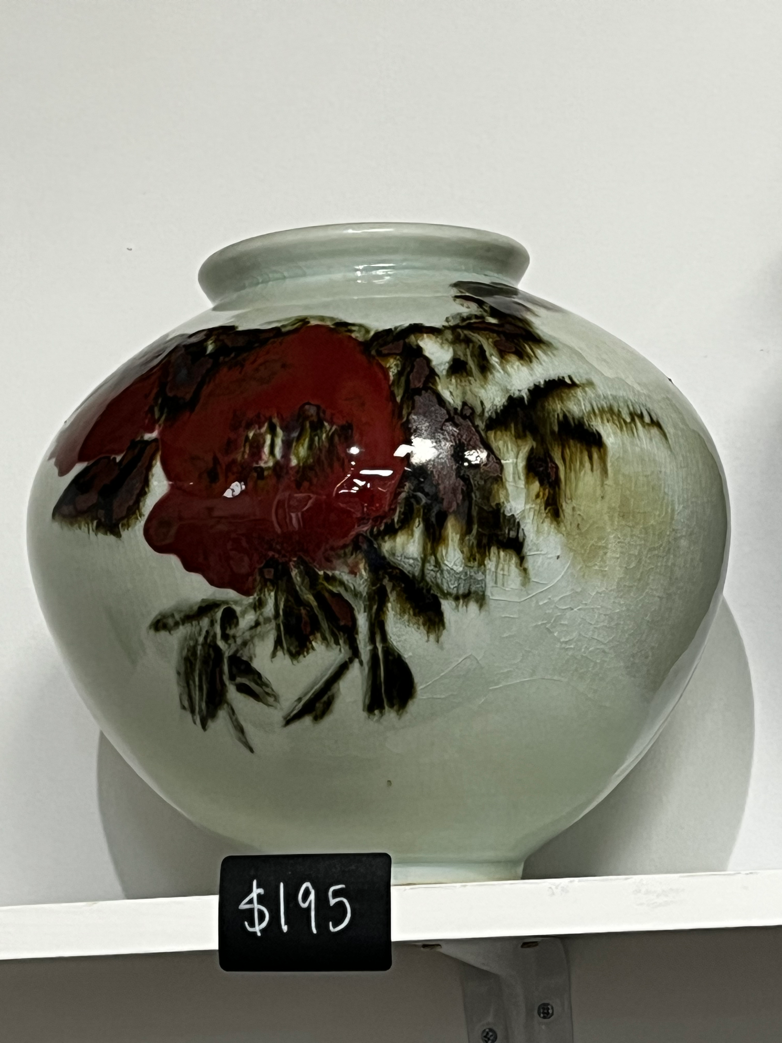 Round vase with flower