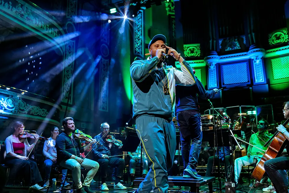 Rapper K Dot performing live with a bassline symphony orchestra