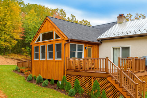 Sunroom addition with deck