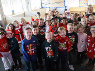 Festive fun doubles as St Alban's combine Christmas Fayre and Jumper Day