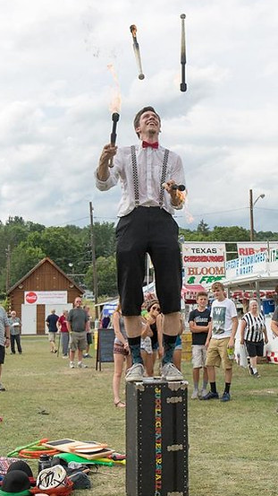 Image of juggler performing.