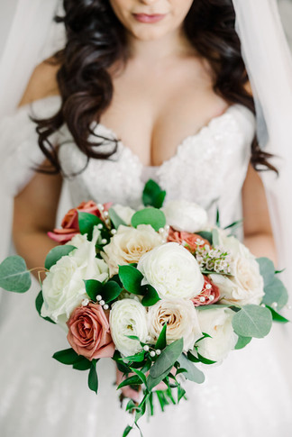 12. Bride’s bouquet close-up showing ivory and blush roses — Richmond wedding photographer detail capture.