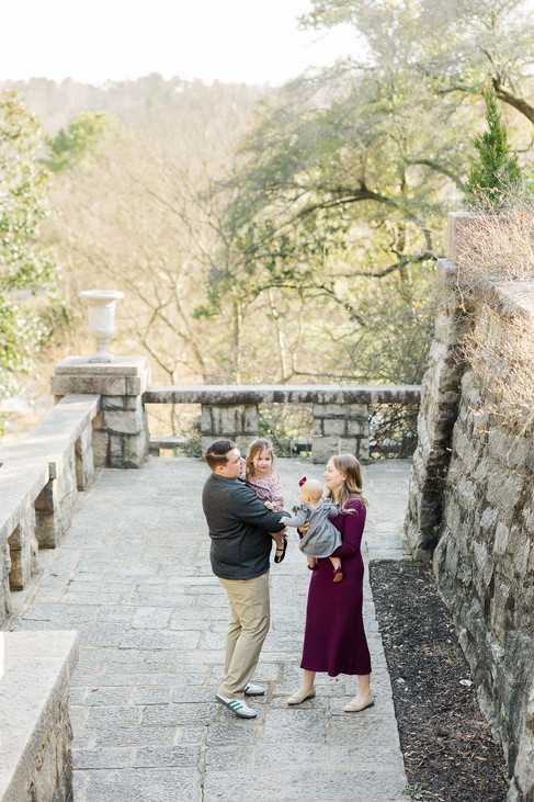 1. parents embracing during family session at Maymont Park in Richmond Virginia