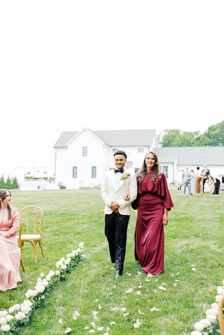 19. Wedding party walking down the aisle during a backyard wedding ceremony in Sandy Hook, Virginia