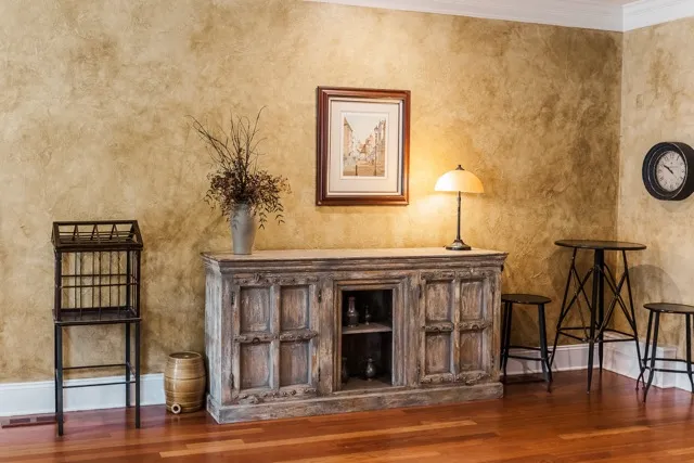 	15.	Charming fireplace mantel with simple decor, creating an inviting atmosphere at The Mill at Fine Creek.
