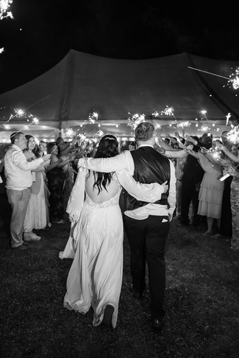 23. Black and white sparkler exit photo at Foxrun Venue & Events wedding