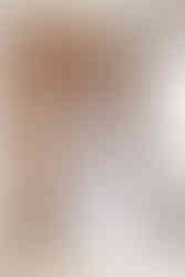 1. Wedding dress hanging near a window at a Richmond VA elopement